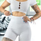 CONJUNTO DEPORTIVO DE MUJER DE SHORT Y BLUSA STRETCH PUSH UP