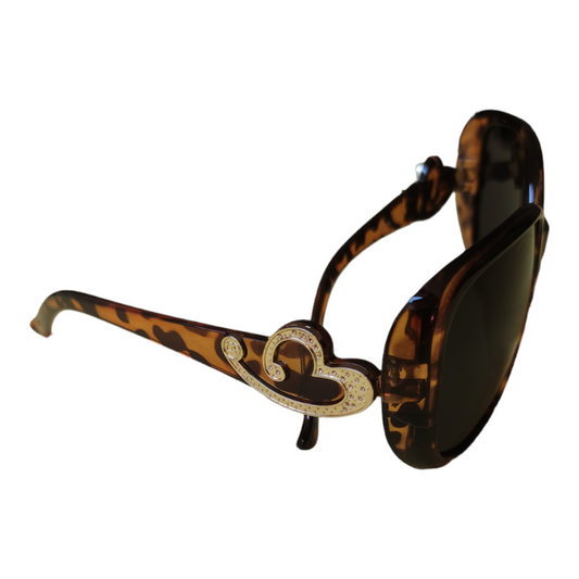 Lentes de sol  para dama, decoración lateral .